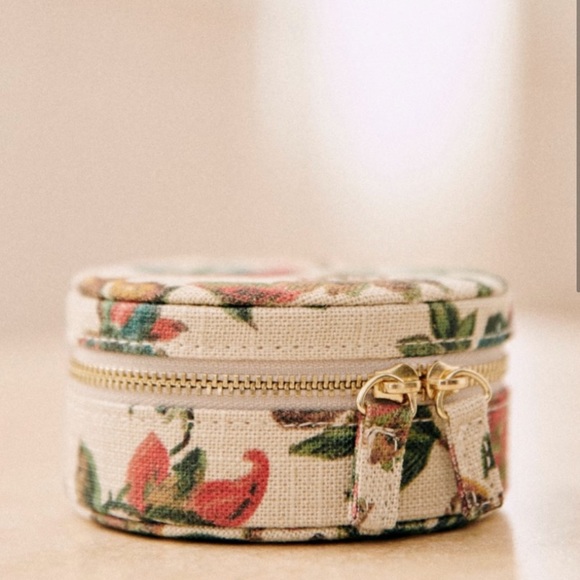 Sezane Accessories - Sezane floral round jewelry travel case / box